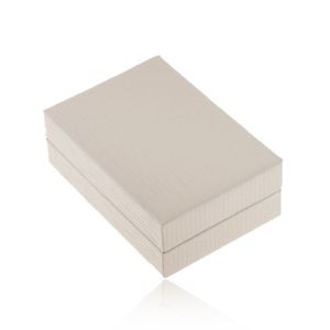 Białe skórzane pudełeczko na kolczyki, lśniąca powierzchnia z nacięciami