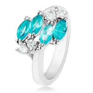 Lśniący pierścionek srebrnego koloru, niebieskie cyrkoniowe ziarenka, przezroczyste cyrkonie - Rozmiar : 50