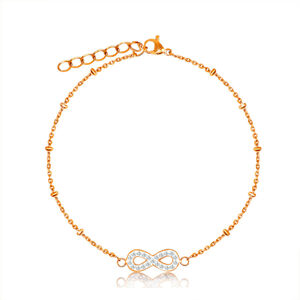 Stalowa bransoletka miedzianego koloru - symbol nieskończoności z kryształkami, delikatny łańcuszek z koralikami