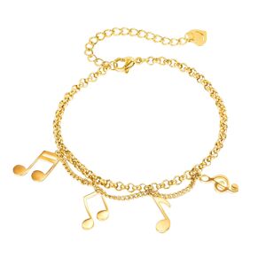 Stalowa bransoletka z motywem muzycznym - nuty i klucz wiolinowy, buźka w kształcie serca, złoty kolor