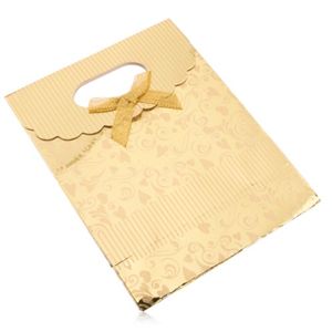 Upominkowa torebka z papieru, lśniąca powierzchnia złotego koloru, serduszka, spirale, paseczki