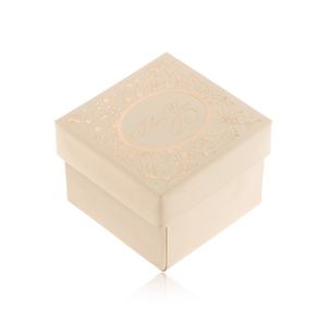 Upominkowe pudełeczko w beżowym odcieniu, ornamenty i napis złotego koloru