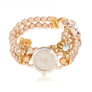 Zegarek na rękę, cyferblat z cyrkoniami, bransoletka z koralików złotego koloru, kwiaty