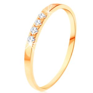 Złoty pierścionek 585 - cienkie lśniące ramiona, linia czterech przezroczystych cyrkonii - Rozmiar : 49